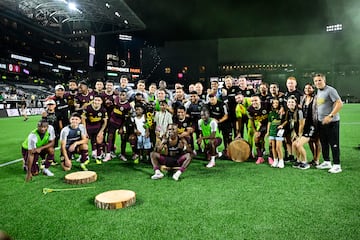 Portland Timbers booked their place in the knockout stages with a 4-0 win over Colorado Rapids.