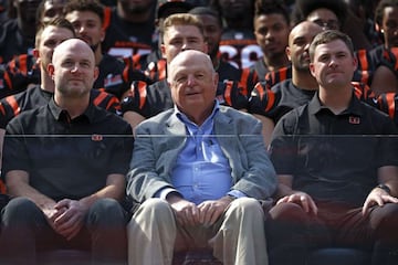 Director of player personnel Duke Tobin (left), owner Mike Brown (centre) and head coach Zac Taylor of the Cincinnati Bengals pose for a team photo ahead of Sunday's Super Bowl against the Los Angeles Rams.